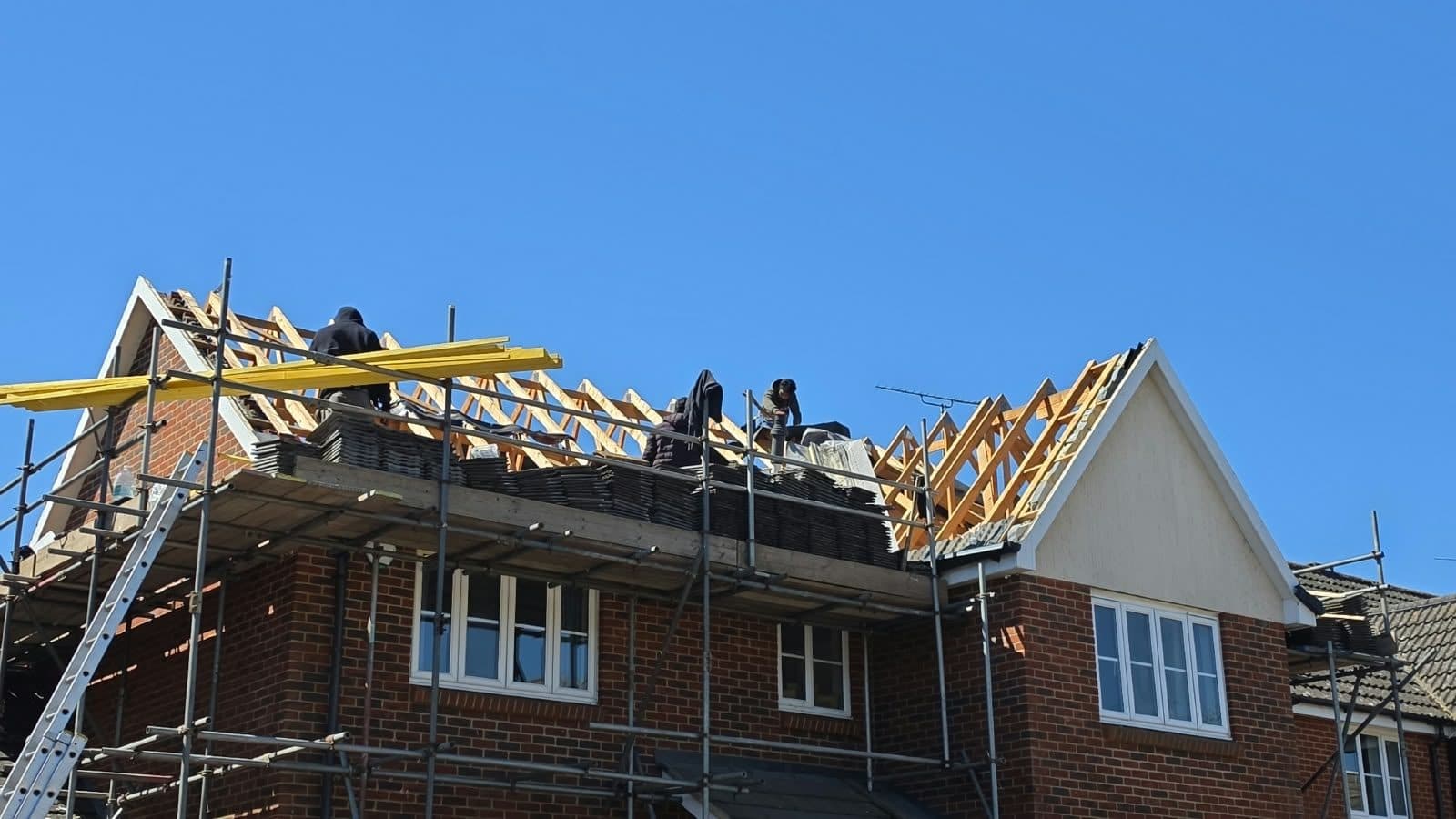 Sovereign team re-roofing a house